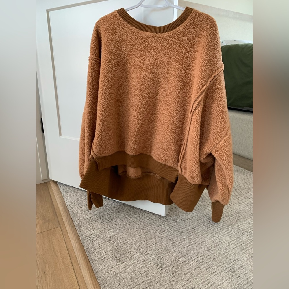 WE THE FREE by Free People 
Cozy brown sweater 
Can't recall the name